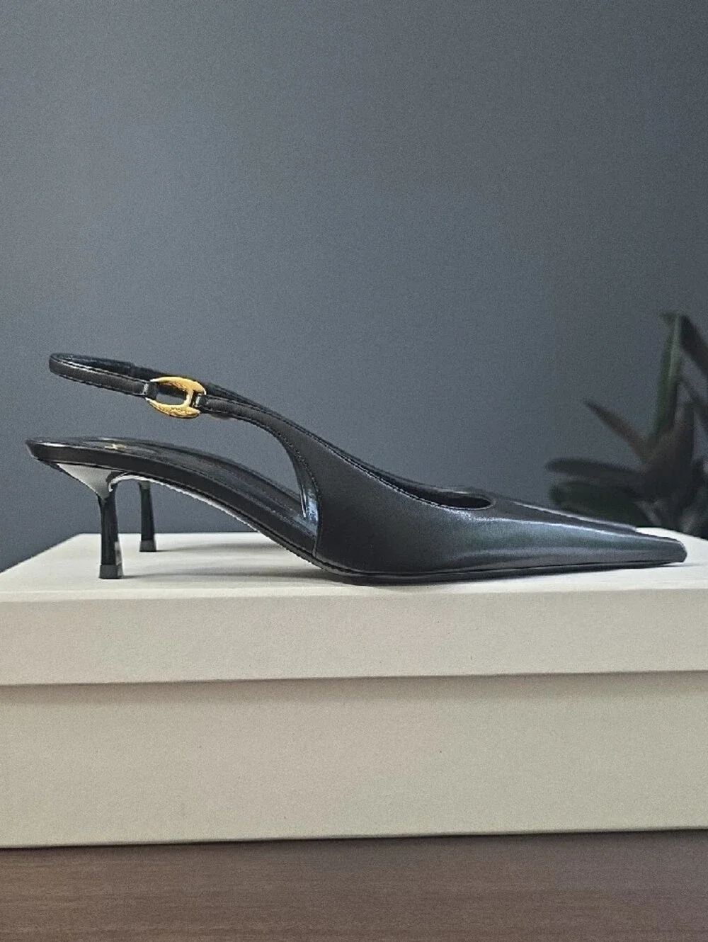 Saint Laurent Black Leather Pointed Slingback Pumps with Gold Accents - Picture 4 of 16
